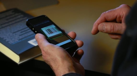 This Alpha Anywhere/HTML5 application is scanning a barcode to retrieve information about a book. Alpha Anywhere simplifies the building of these kinds of applications, while Adobe PhoneGap gives the app the ability to access device hardware, in this case the camera.